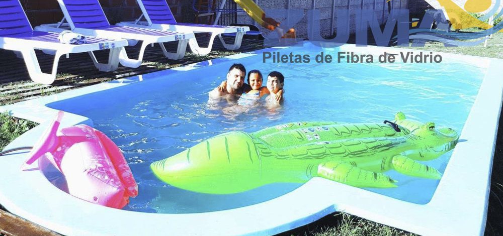 Two funny girls playing in swimming pool. Vacation and travel concept